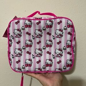 Hello Kitty lunch box
Strawberry milk and cupcakes
Pink and white stripes